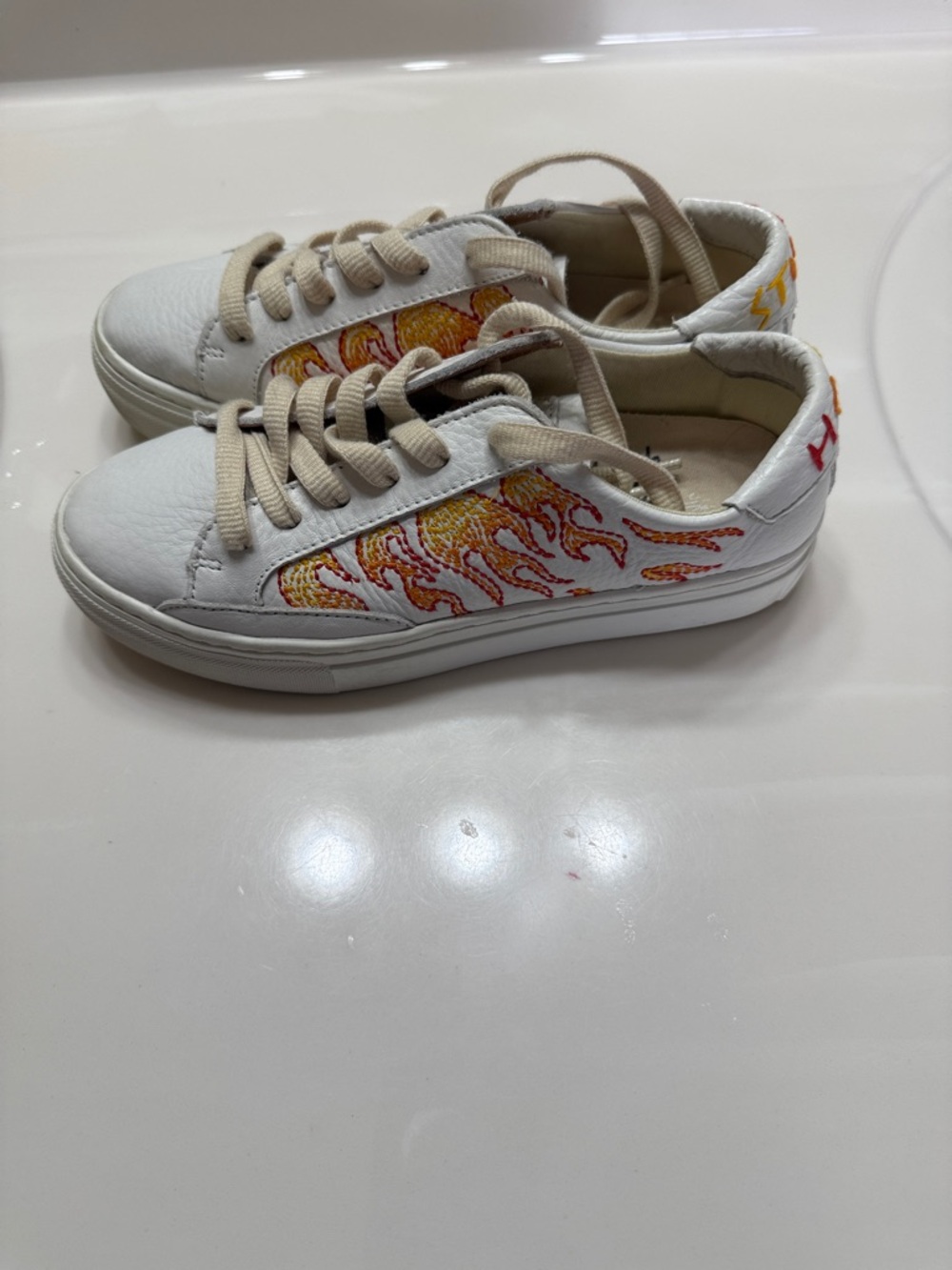 Soludos Hot Stuff White Ibiza Sneakers with Yellow & Orange Flame Motif